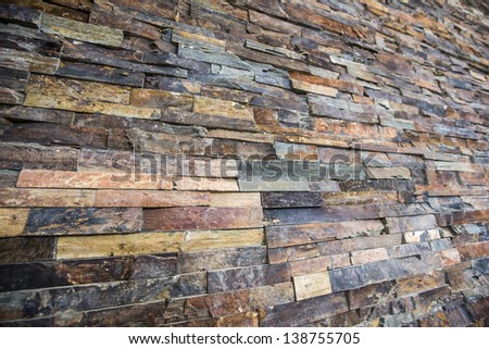 Natural stone strips on a wall luxurious indoor wall