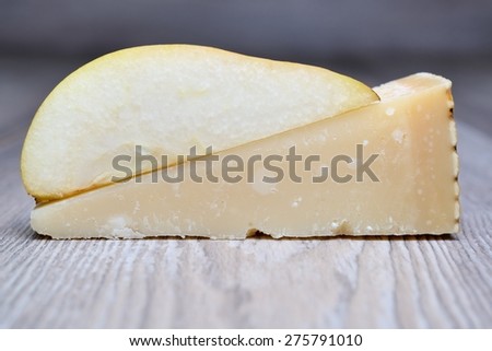 cheese shavings and slice pear