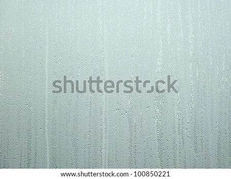 Water drops on steamed up window . Ideal for background and fills.