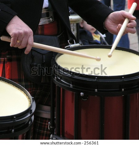 Scottish bandsman beats the drum