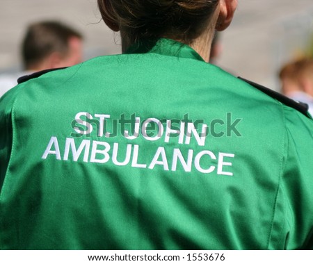 St John Ambulance worker offering medical service