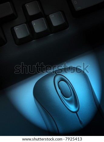 Wireless keyboard and mouse with blue spotlight effect