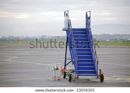 Aircraft steps on deserted runway at airport