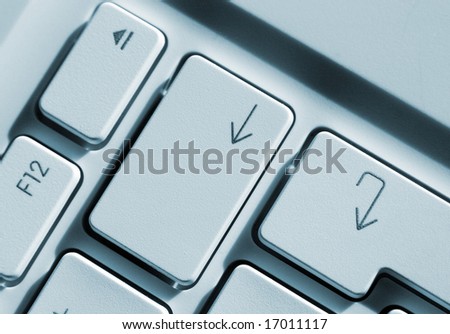 Close-up view of arrow keys on computer laptop
