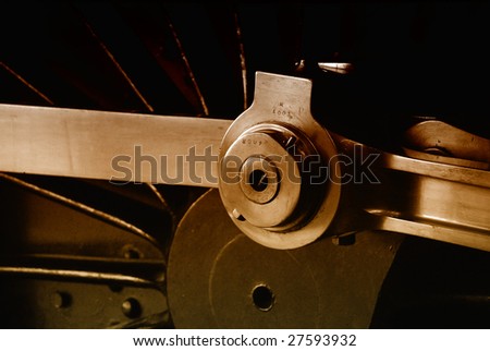 Close-up of steam engine wheel with brown color overlay