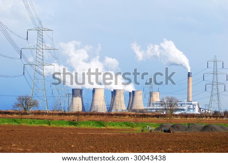 Wide angle view of coal power station with pylons
