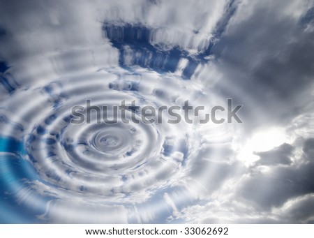 Water ripple effect applied to blue cloudy sky