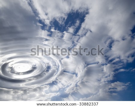 Water ripple effect applied to cloudy blue sky