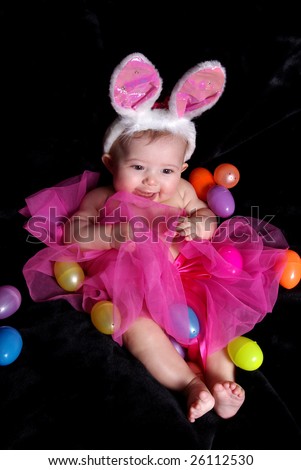baby girl wearing tutu and rabbit hat