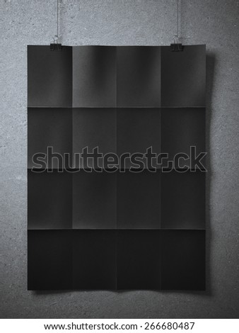 Black folded  sheet of paper