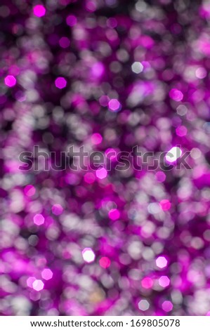 Purple Lights Festive background. Abstract bright background with bokeh defocused  purple lights
