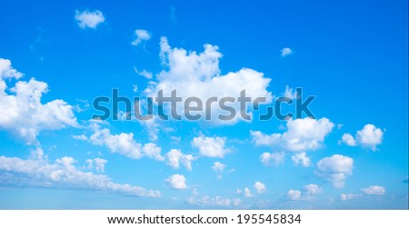 Background blue sky with white floating cumulus clouds  move far away