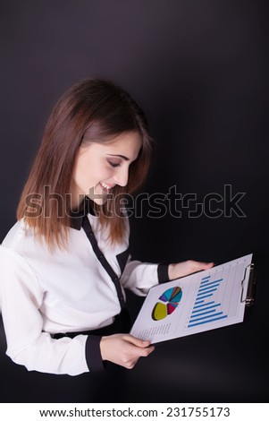 Portrait of business woman with clipboard