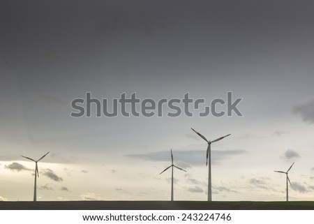 Group of windmills for renewable electric energy production. Bremen, Germany.