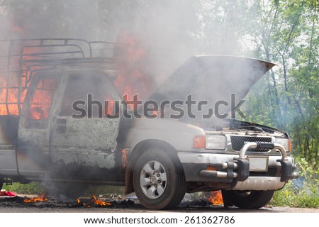 UDONTHANI-MARCH 14,2015:Car on fire after short circuit on the Highway between SAKHONAKHON-UDONTHANI road.Udonthani thailand 14 march 2015