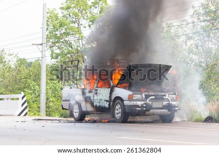 UDONTHANI-MARCH 14,2015:Car on fire after short circuit on the Highway between SAKHONAKHON-UDONTHANI road.Udonthani thailand 14 march 2015