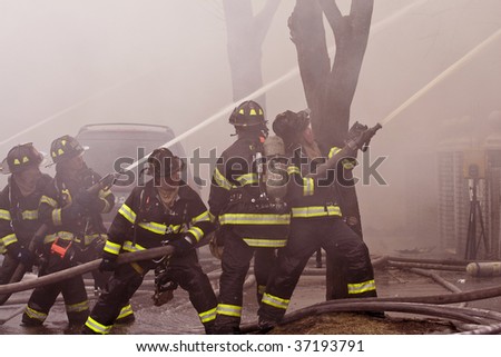 QUEENS,  NY - FEBRUARY 12: Firemen on duty on February 12, 2009 in Queens, New York.