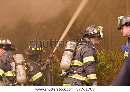 QUEENS,  NY - FEBRUARY 12: Firemen on duty on February 12, 2009 in Queens, New York.