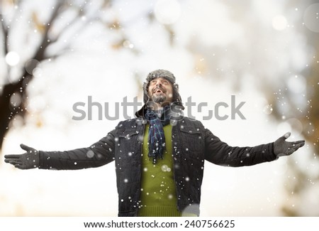 A man playing with snow