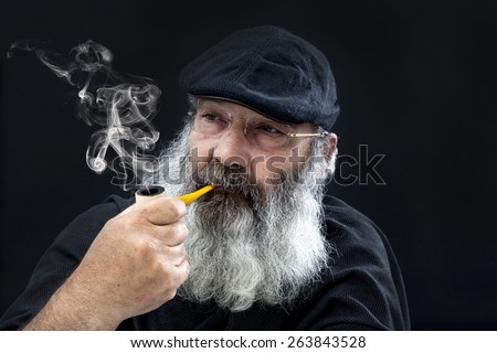 Senior portrait with white beard and pipe