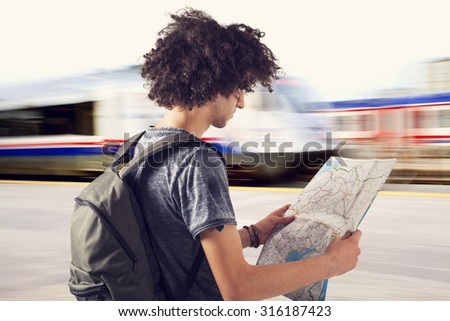 Young traveler on train station