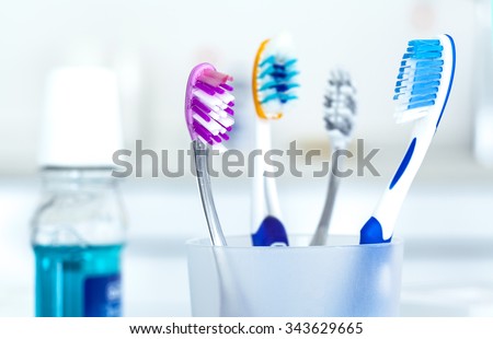 Tooth brushes in glass