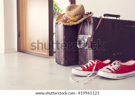 Vacation suitcase by front door
