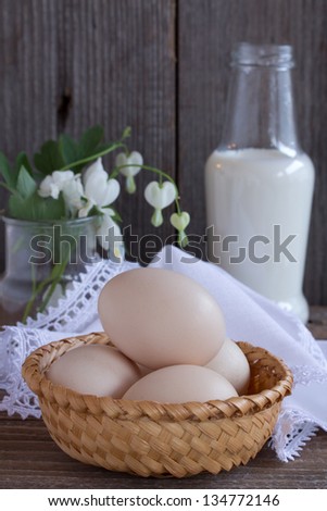 Fresh milk, wheat seeds and two eggs