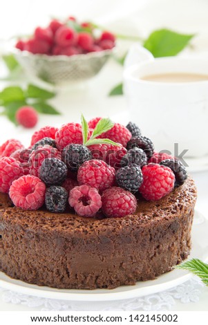 Chocolate mousse cake with raspberries.