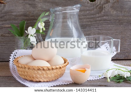 Fresh milk, wheat seeds and two eggs