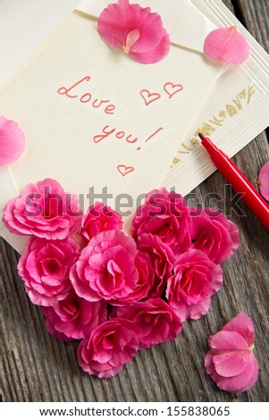 Card with a declaration of love against the background of the heart...