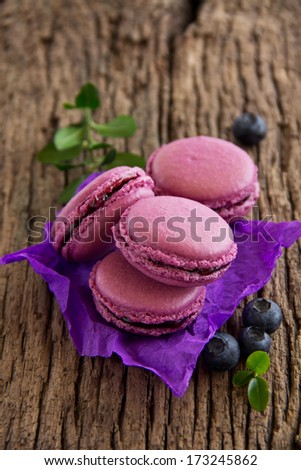 Makarons French pastries stuffed with black currant.