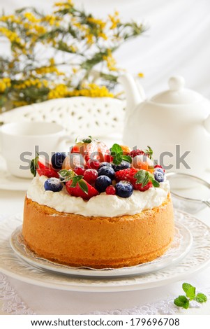 Chiffon cake with summer berries and cream.