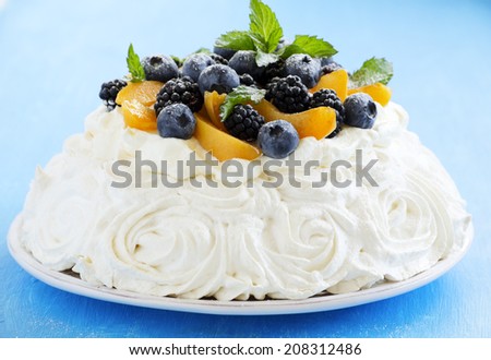 The Pavlova cake with blueberry, BlackBerry and apricots.