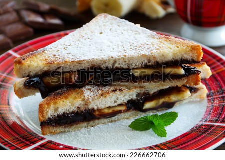 Toast with bananas and chocolate nut paste.