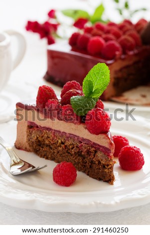 chocolate brownie cake with raspberries.