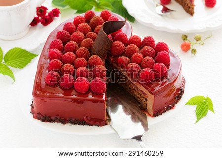chocolate brownie cake with raspberries.