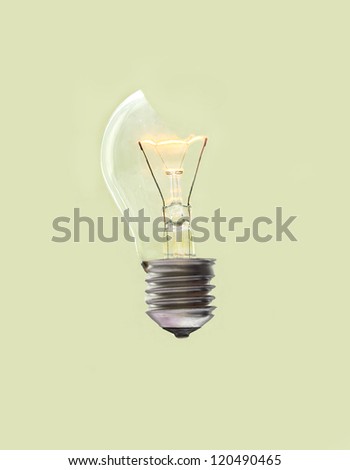 broken light bulb with tungsten filament still working