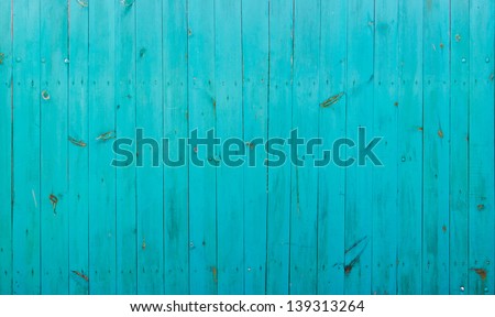 Blue wood background. Close-up view of old wood wall colored in blue.