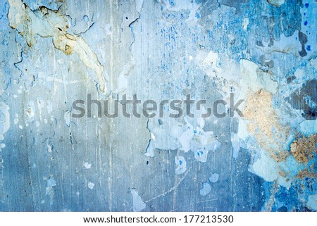 Blue grunge textured wall closeup