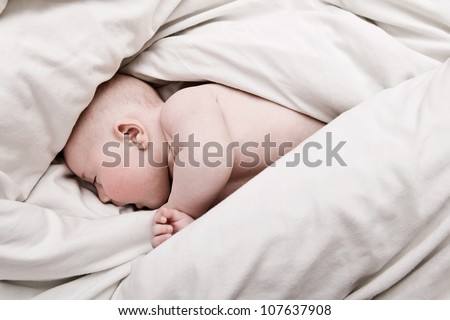 Four Month old baby boy in Duvet Covers