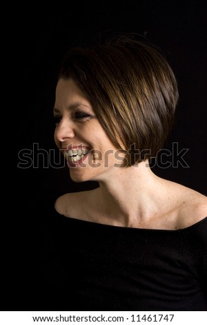 Attractive Brunette Girl in Studio - Laughing off Camera