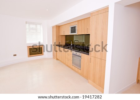 Angled View of Luxury Brand New Kitchen in Luxury Apartment