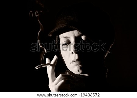 Woman Holding Cigarette with \'NO\' in the Smoke - NO SMOKING!!