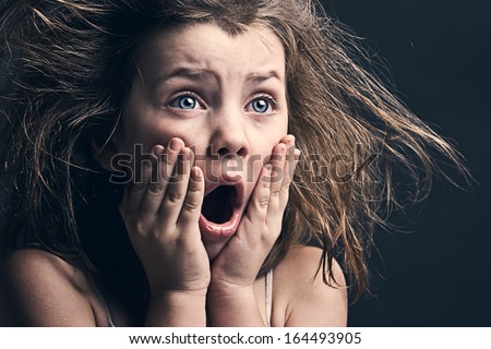 Powerful Shot of Scared Young Girl