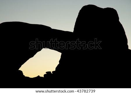 south window arch back lit sunrise