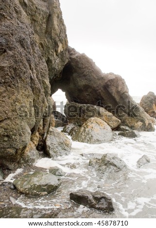 rock window in a coastal rock formations