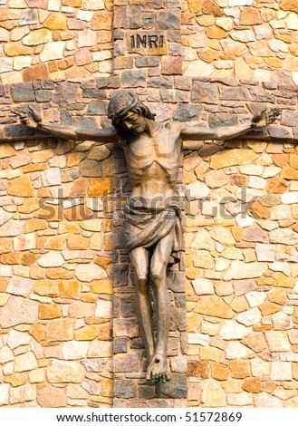 Jesus on the cross, stone church statue