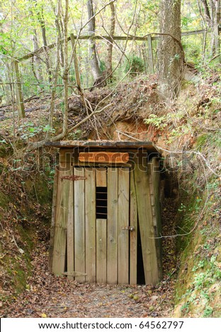 old, damaged gold mine entrance