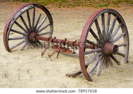 broken and rusty wagon wheels